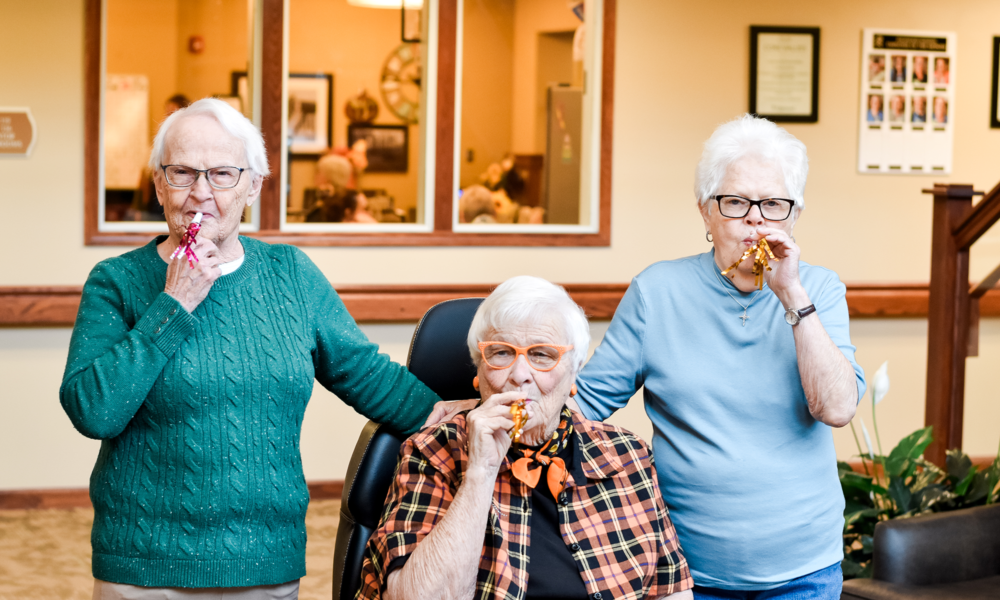 3 ladies with party favors