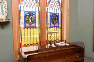 Hermantown MN stain glass window and piano