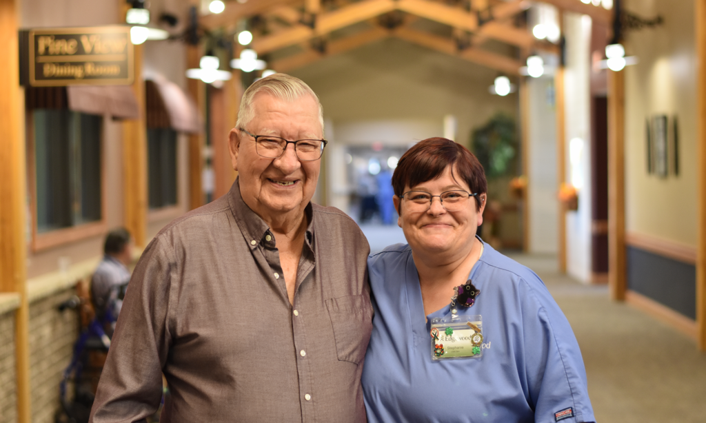 Male senior and female staff