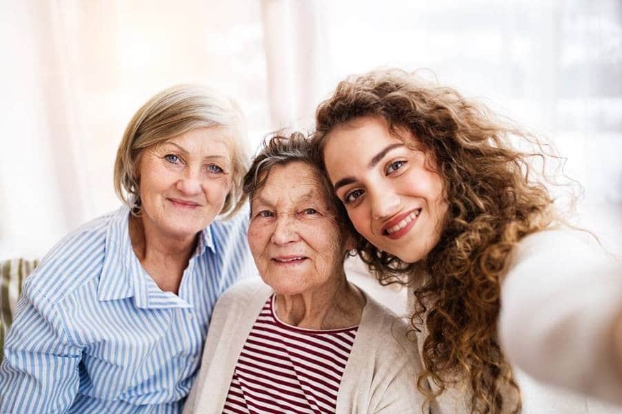 Two female seniors next to female