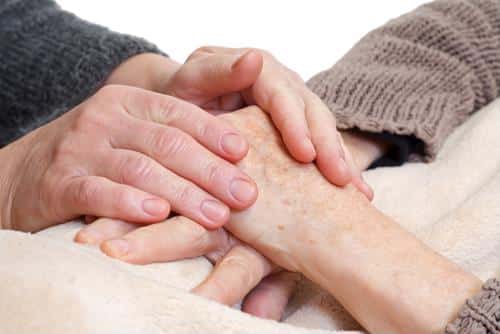 two people holding hands