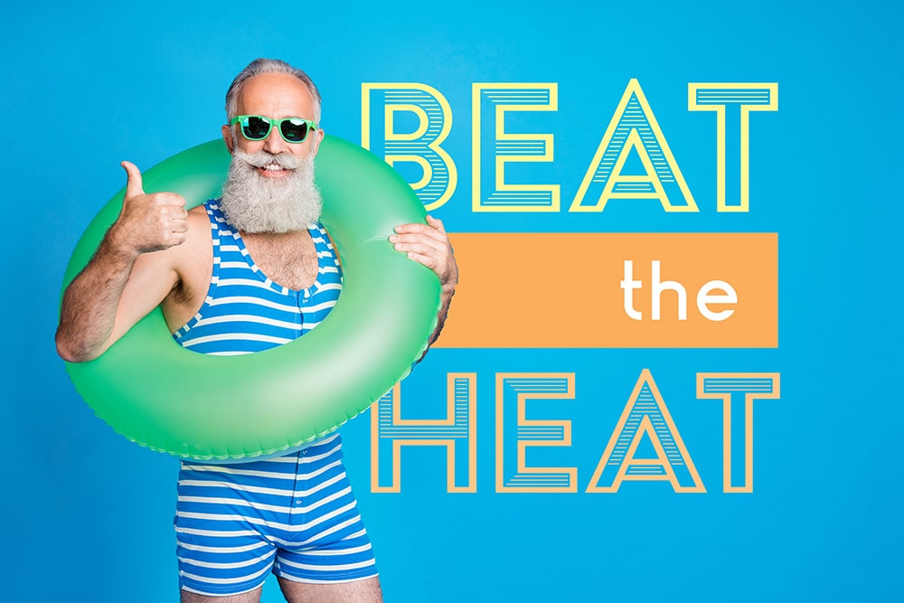 Male wearing old fashioned blue and white striped swiming suit and floatation device