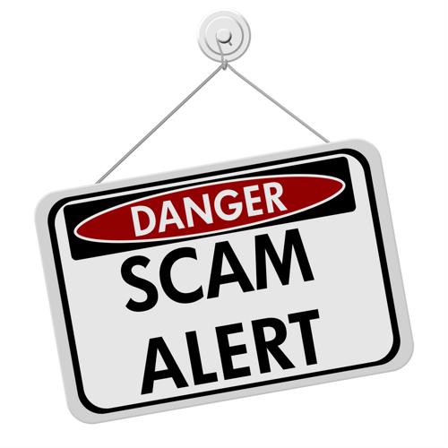 Sign that states danger scam alert