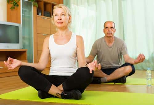 Couple doing yoga