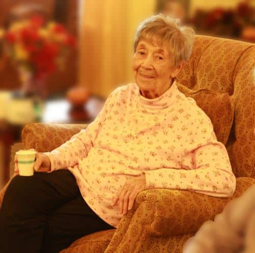 Female senior with coffee