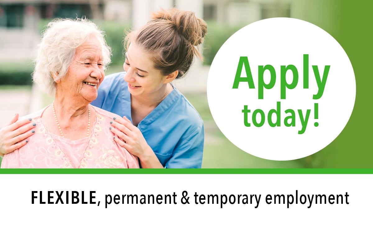 Female staff embracing female senior with words APPLY TODAY next to image